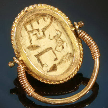 Typical Egyptian scarab ring with cartouched scarab set in gold swivel ring (image 11 of 15)